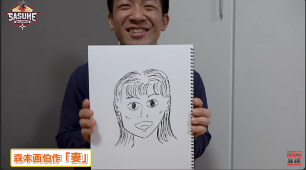 妻の似顔絵を描く森本裕介